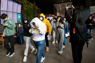 Migrants deported from the US arrive at El Dorado International airport in Bogota on Tuesday